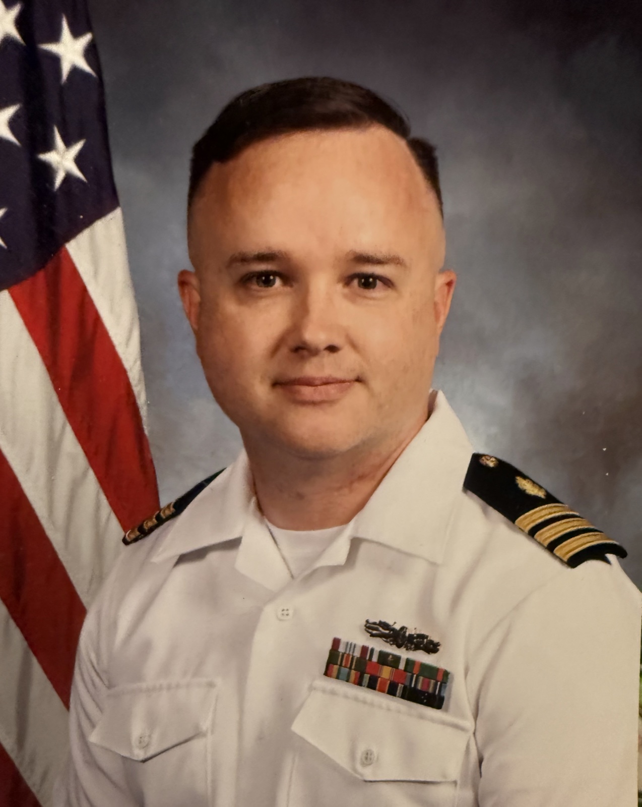 Justin Hefley in U.S. Navy service dress white uniform
